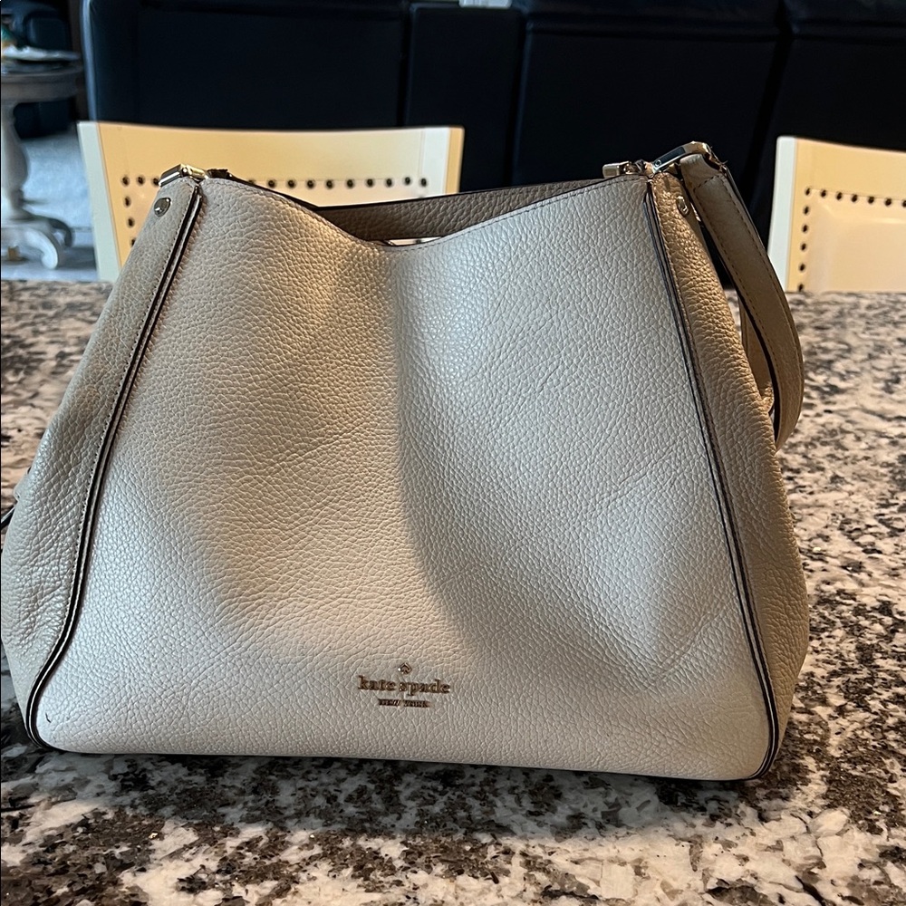 Kate Spade Beige Leather Shoulder Bag used in nice condition.  Medium size bag